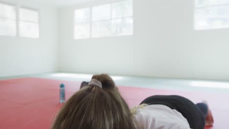 caucasian woman doing push ups