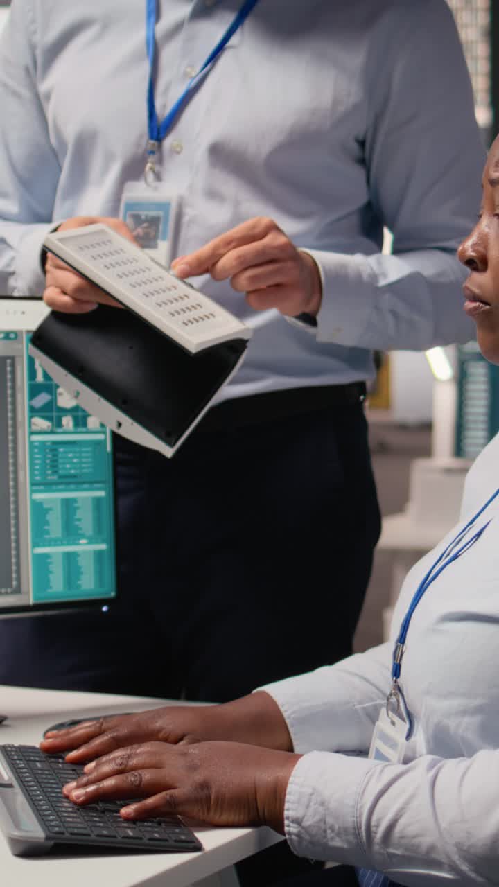 Employees talking, evaluating solar cell technology alternative energy device