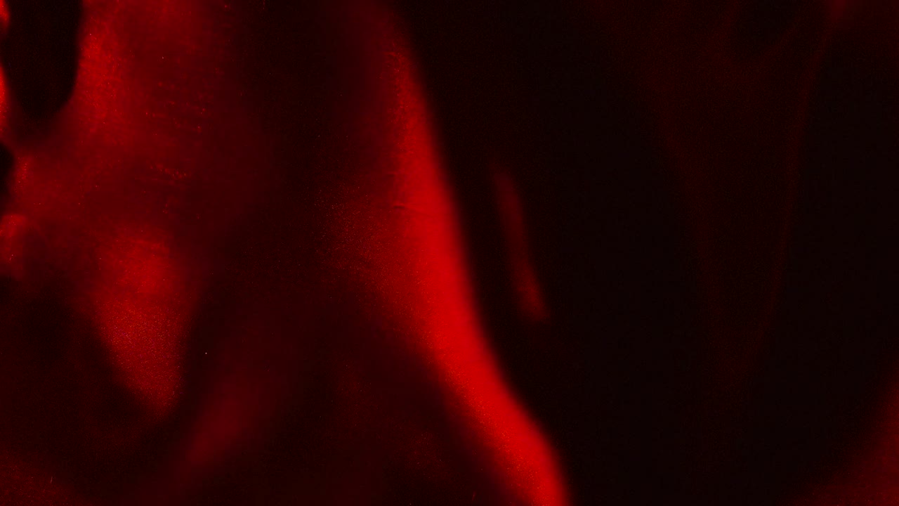 Red Seamless Wave satin fabric Background \ Silk cloth fluttering in the wind of waving cloth \