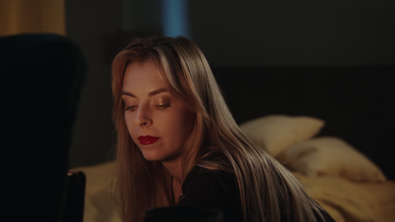 Woman in Bedroom at Night