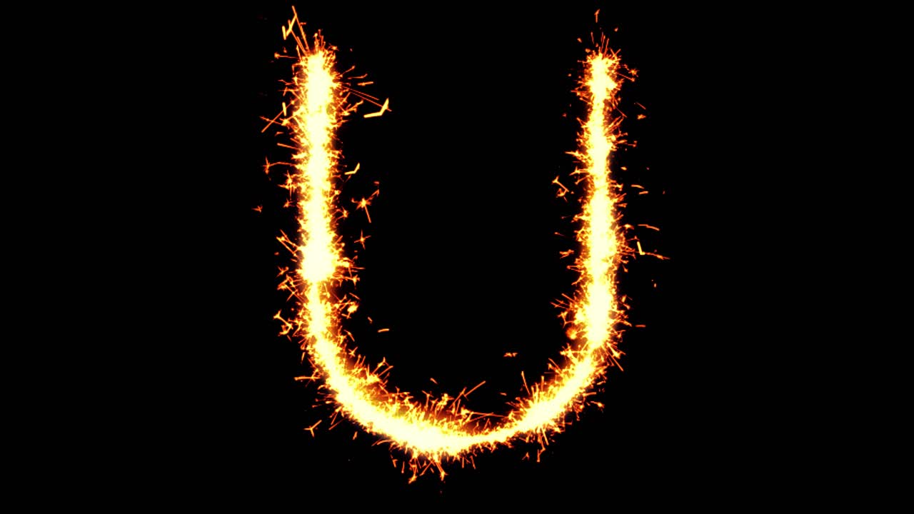 Alphabet u text sparkler writing with glitter sparks particles firework on black 4k loop background