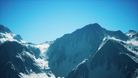 big mountain peaks at sunny day