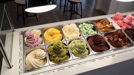 colorful gelato display in a dessert shop