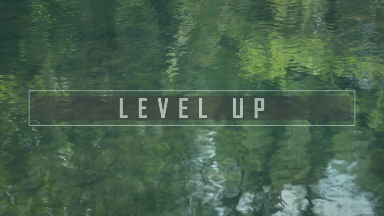 Level up text animation reflecting on green water surface with ripples