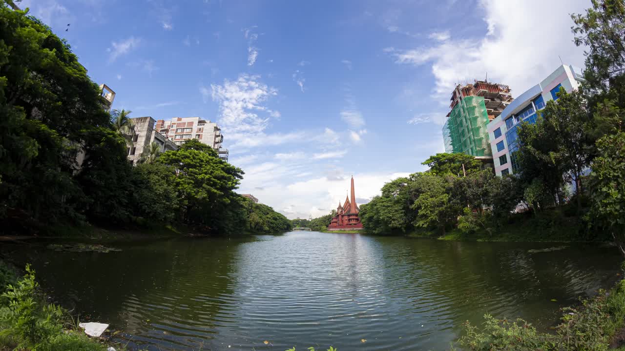 A nostalgic timelapse of Dhanmondi Lake in Dhaka, featuring the iconic Ship House before its demolition, with clouds dynamically moving in the background.