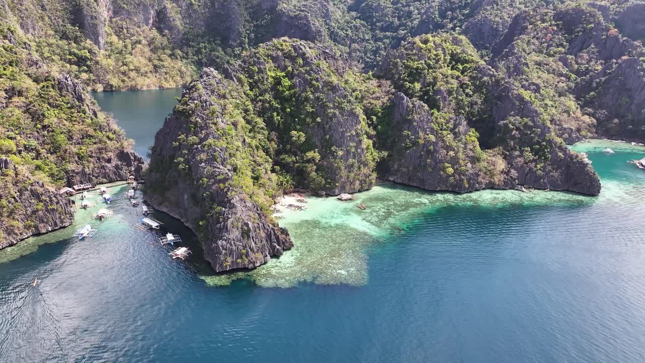 Breathtaking aerial scenery of Coron Island with lagoons surrounded by steep cliffs. Philippines.