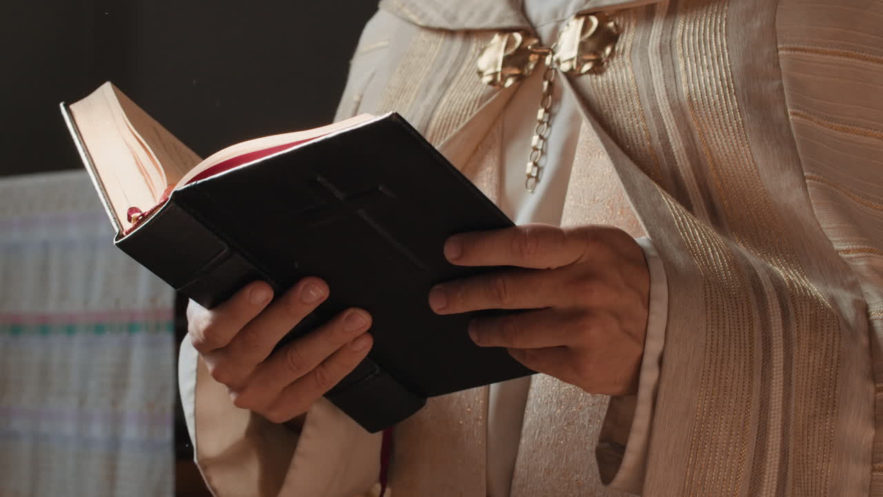 Religious Clergy Reading a Bible