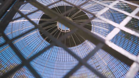 park glass dome through rusty gate