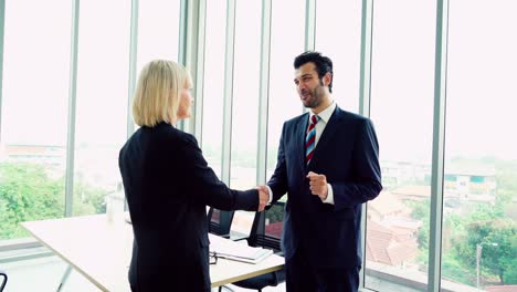 business people handshake with friend at office