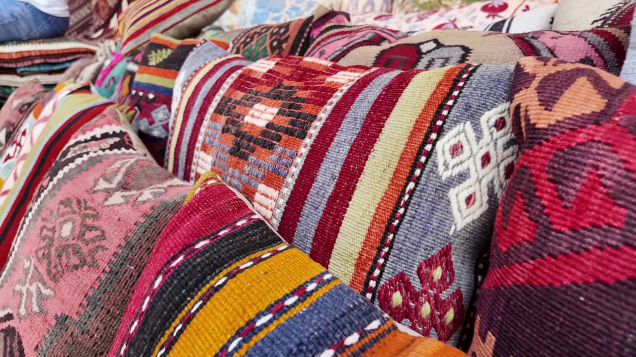 Pile of Colorful Decorative Cushions