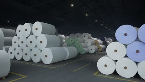 industrial warehouse with stacks of paper and fabric rolls