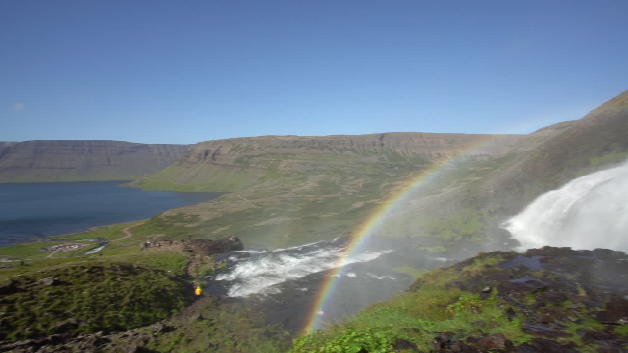 Dynjandi waterfall on Iceland with rainbow