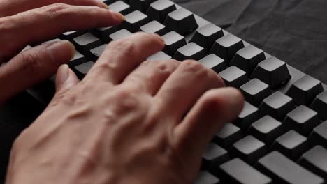 hands typing rapidly on a mechanical keyboard, focus on fingers, tactile feedback, work environment