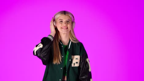 happy young woman listening to music with headphones