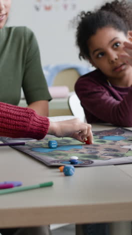 children playing a board game