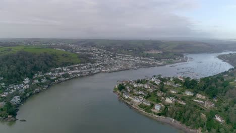 Aerial-sideways-tracking-vista-of-the-historic-seafaring-town-of-Dartmouth-and-Kingswear