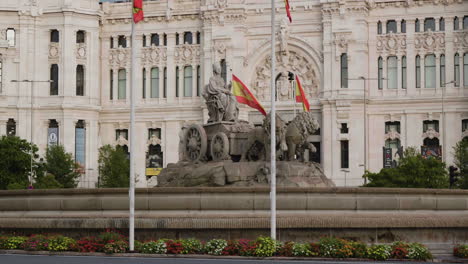 fountain of cybele and cybele palace, palacio de comunicaciones in madrid, spain. - wide shot