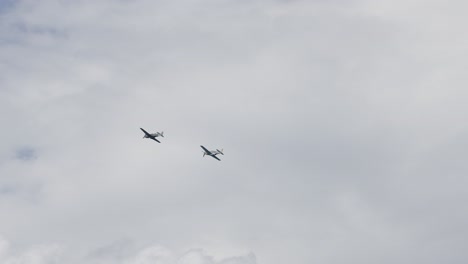 sequence of a plane executing flight tricks in the sky