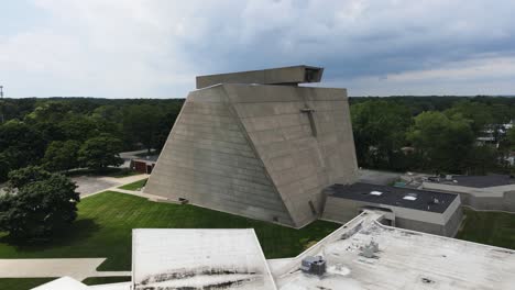 pedestal motion upwards to show the extent of the church in cloudy and stormy weather