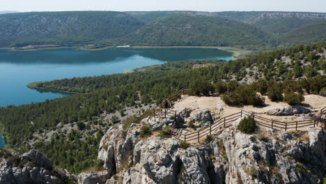 aerial view of tourist enjoying nature at the viewing point of krka national park in croatia