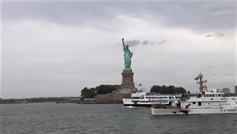 statue of liberty in new york, seen from boat