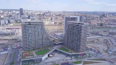 Descending-aerial-4k-shot-of-Belgrade-Waterfront-on-Sava-river-and-Promenada