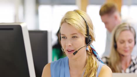 call centre staff working in a modern office