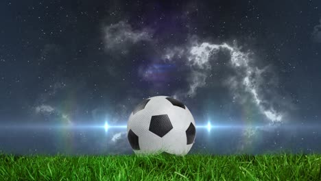 Animation-of-glowing-light-passing-by-football-on-pitch-with-stormy-clouds