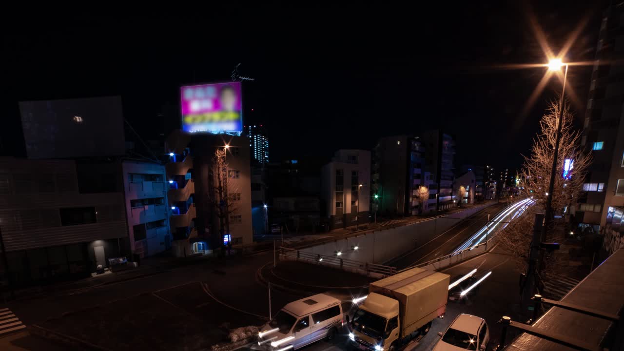 도쿄 시내 거리의 교통체증의 야간 타임스 화면