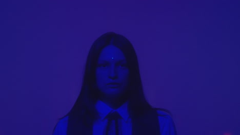 portrait of girl in studio with neon light