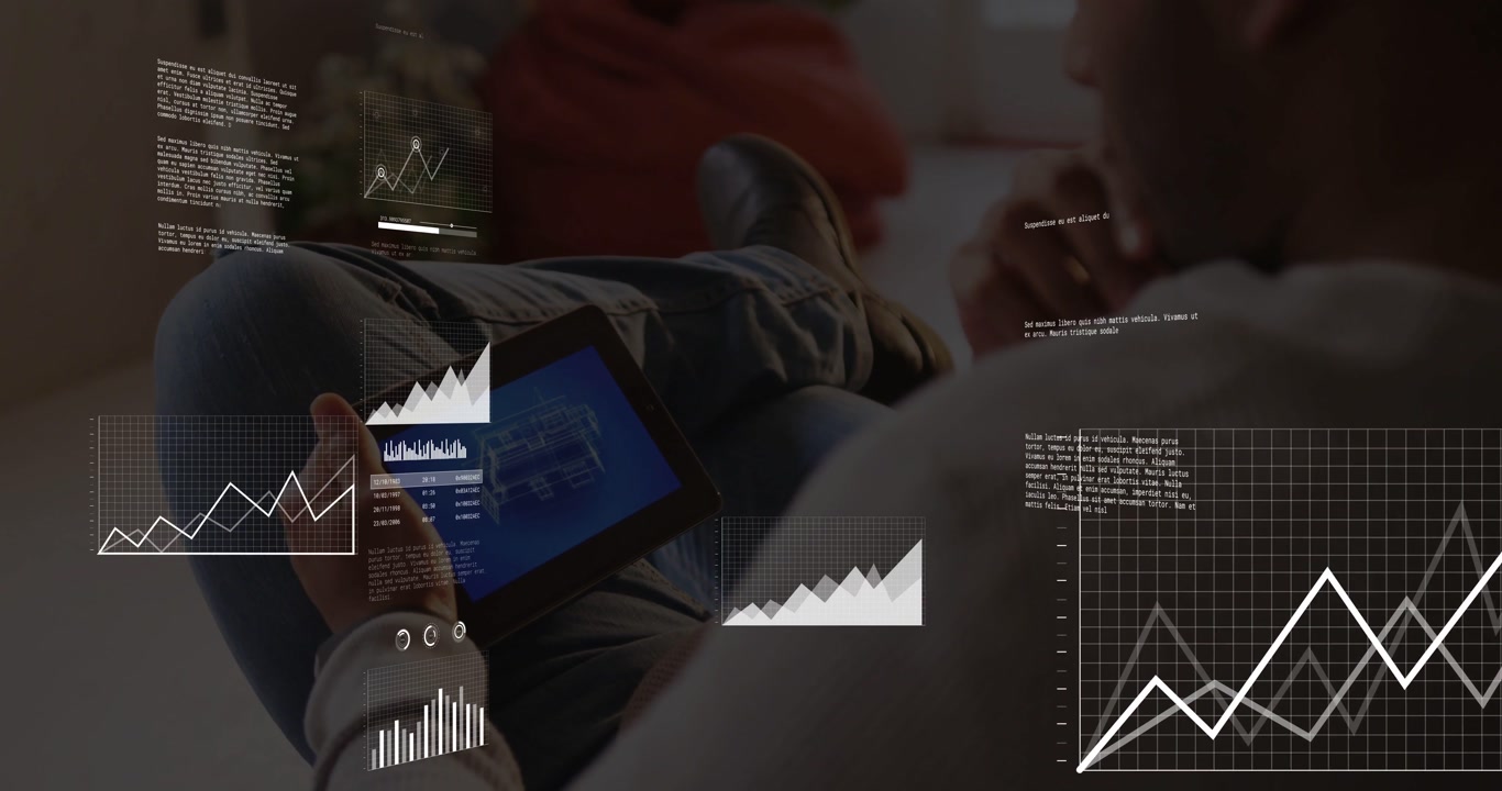 Man tapping tablet in lounge, causing pulsing data overlays, marking charts and reviewing IT data