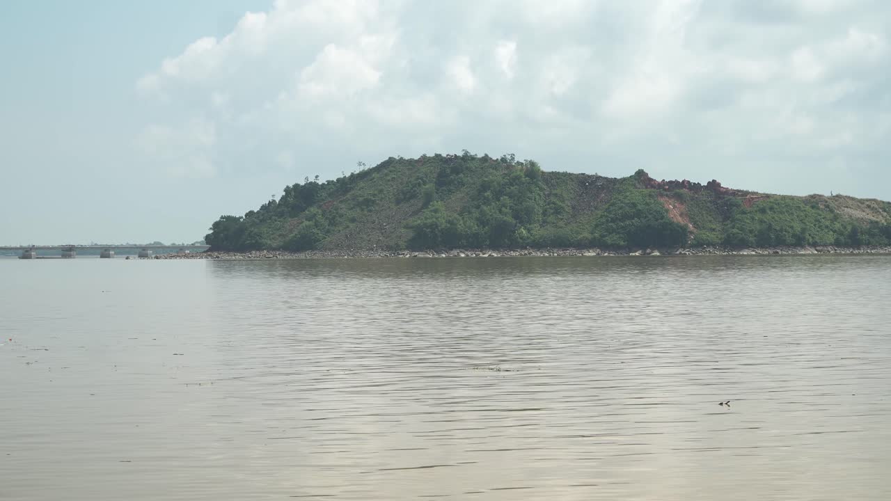 Batang Lupar Sarawak River Ferry Ride View During Summer And Under Construction Longest Bridge Conecting From each side,Sarawak,Borneo.