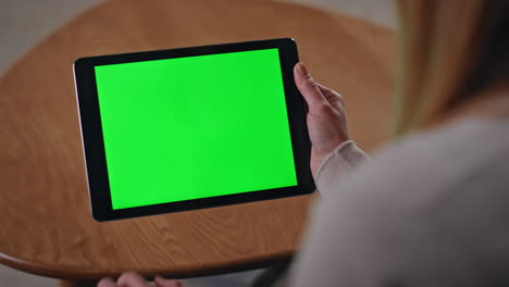 online worker scrolling mockup tablet pointing on touchscreen at home close up.