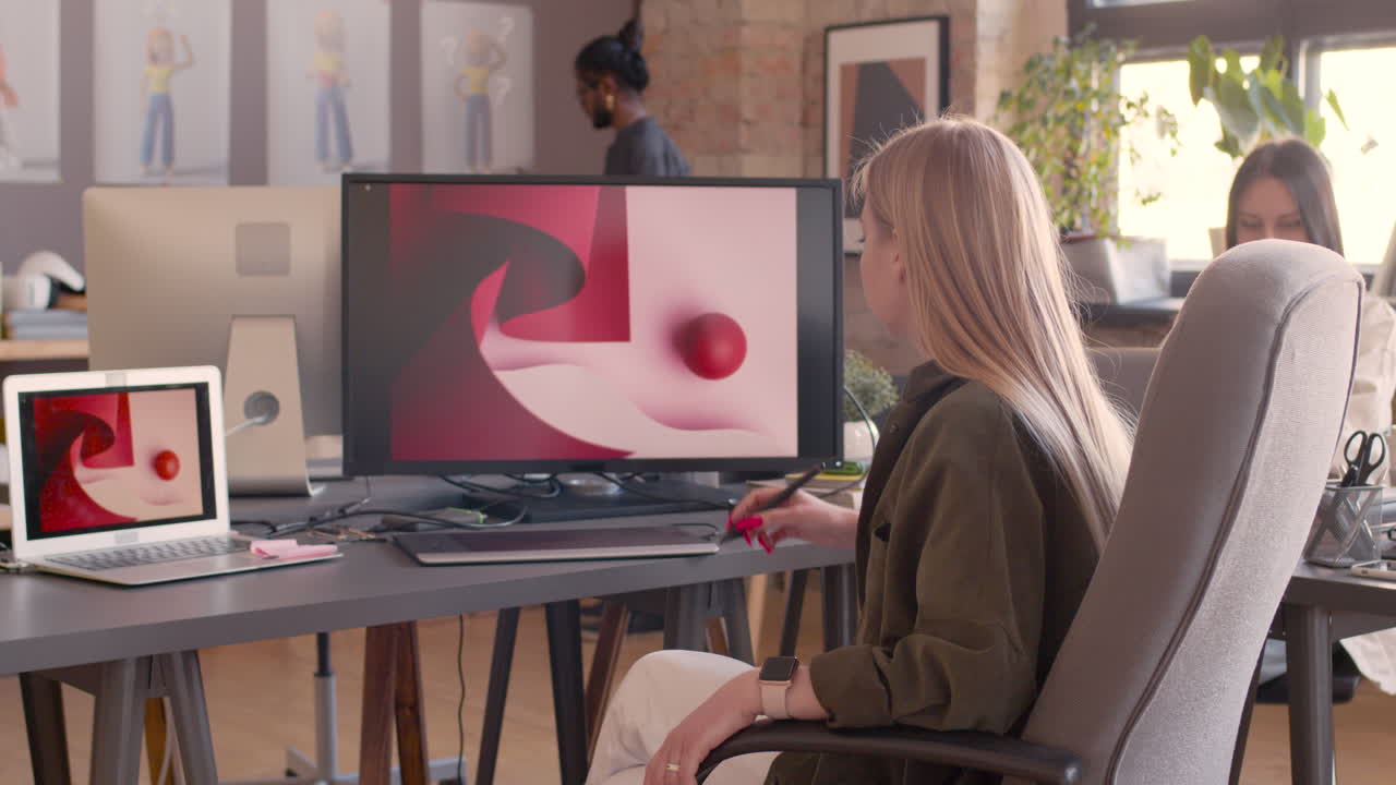 Young Woman Using Her Tablet At Home Next To Her Dog