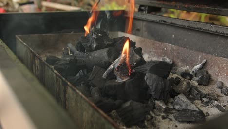 burning charcoal for barbecue cooking