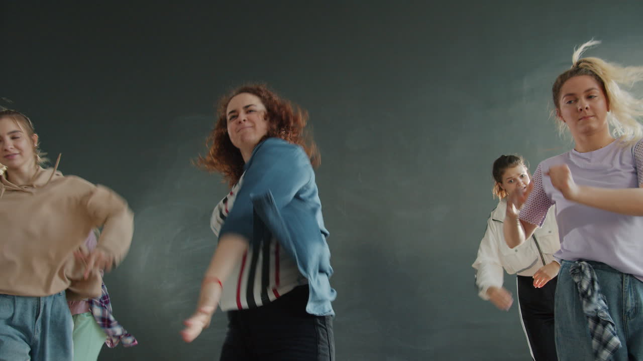 Teenagers Performing Energetic Street Dance Routine