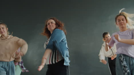 teenagers performing energetic street dance routine