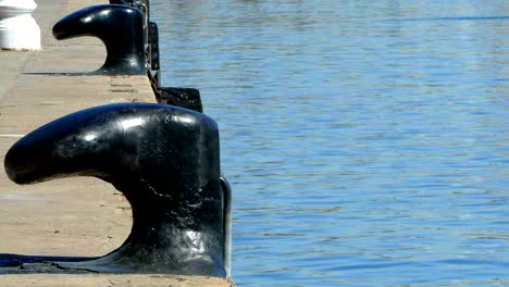 old bollard on the seaport of barcelona