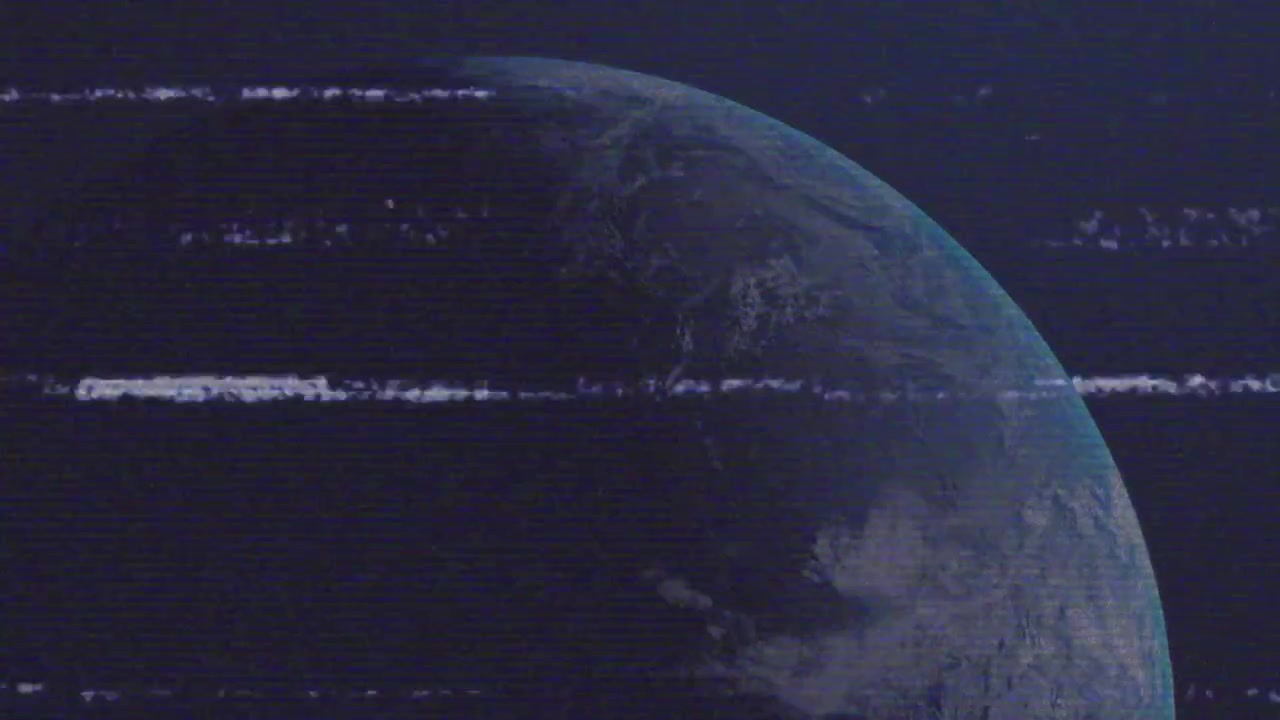 Large Earth-like planet rotating into frame as camera panning and recovering surface beneath static