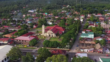 aerial view of cabalian historical church on coastal town in southern leyte, philippines