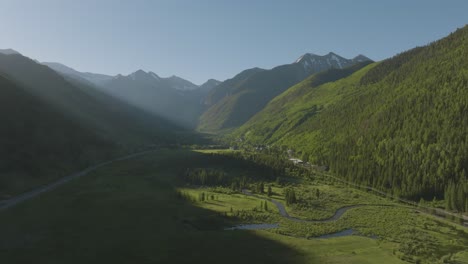 Green-Rocky-Mountain-Valley-Landscape-near-Telluride,-Colorado---Aerial