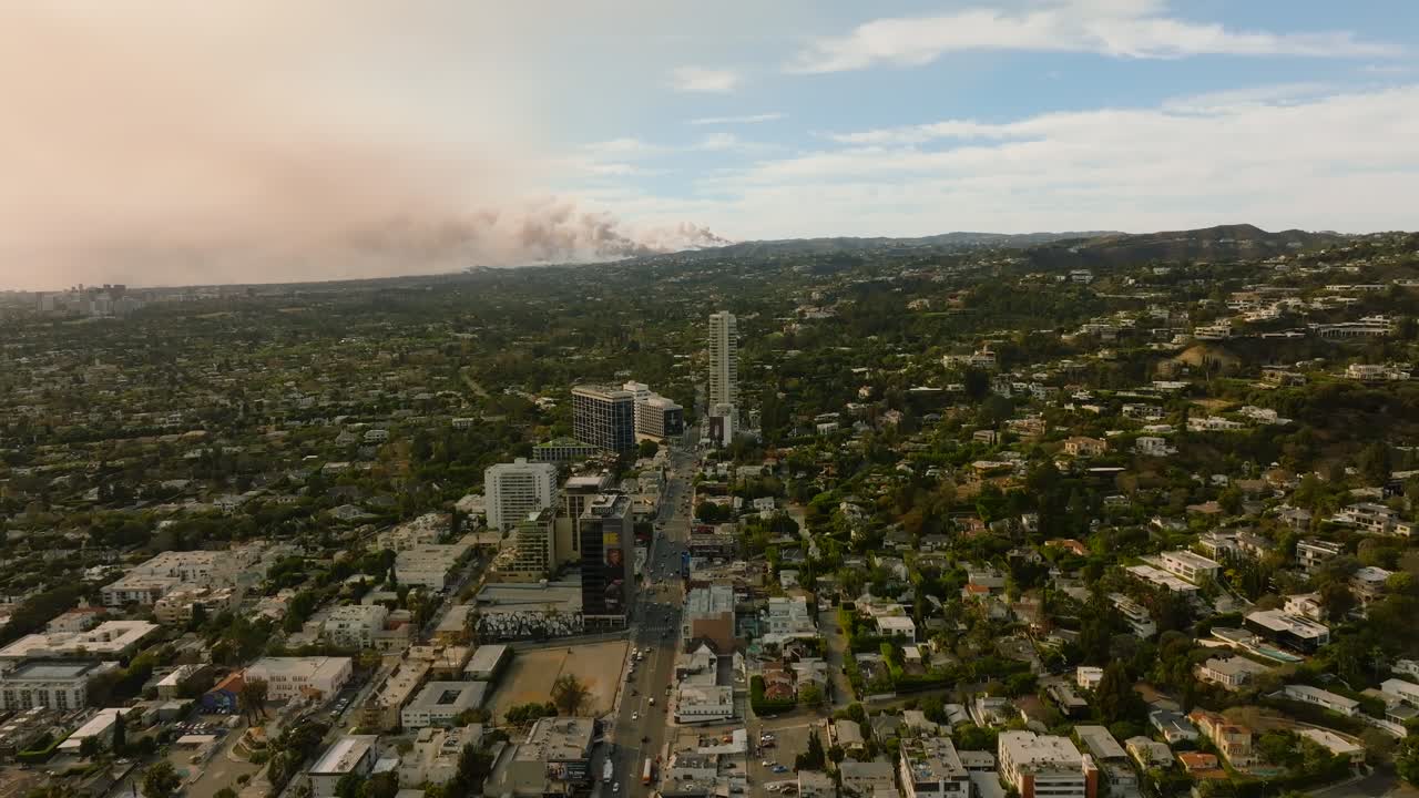 4K aerial of the LA fires in January 2025 from West Hollywood, Los Angeles, California, USA.