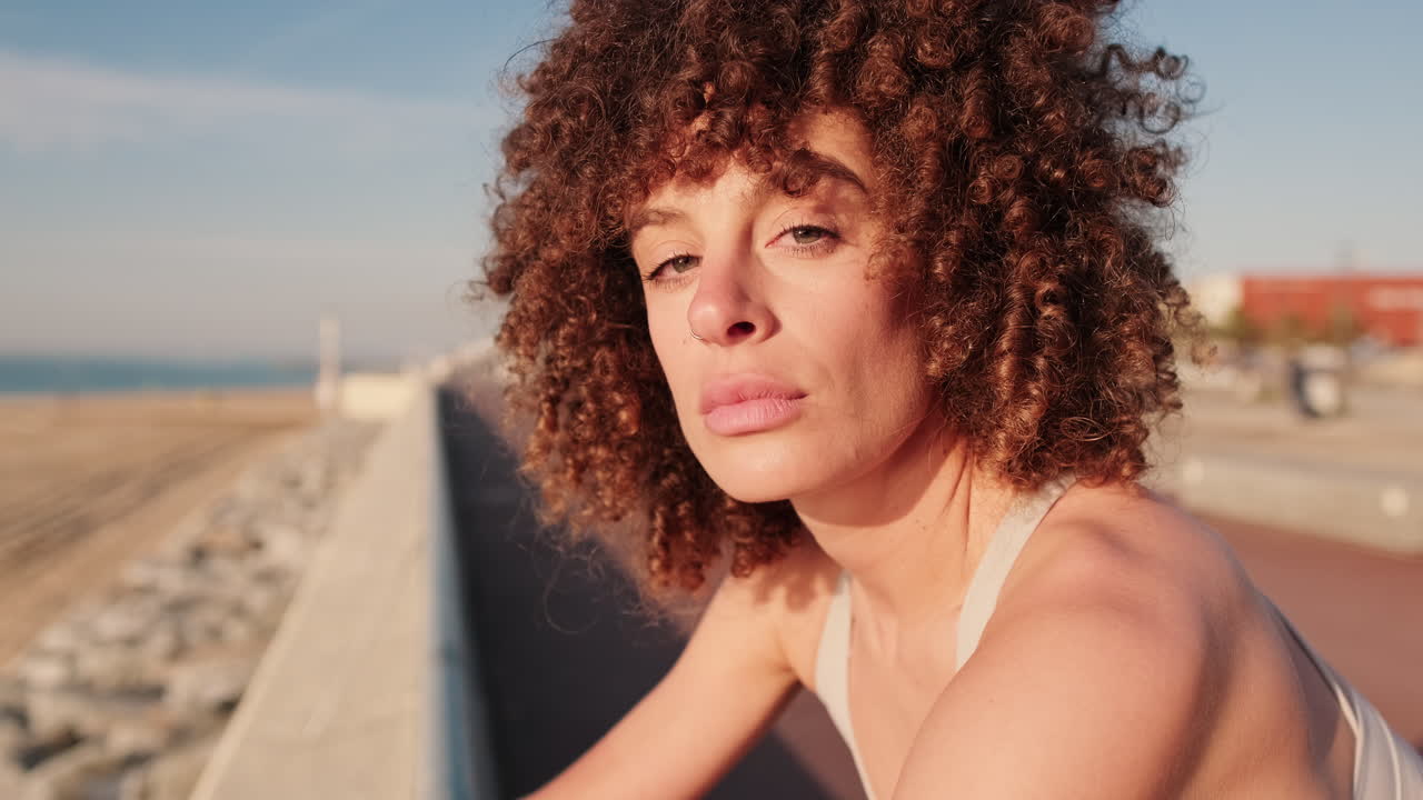 Woman Resting By The Beach
