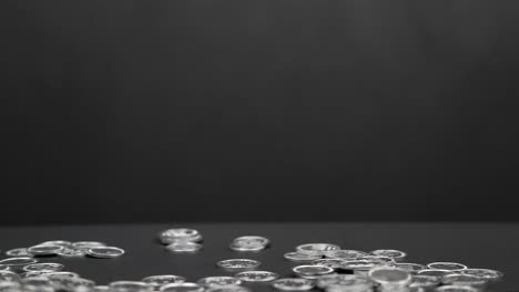 stop motion of coins piling up 4k