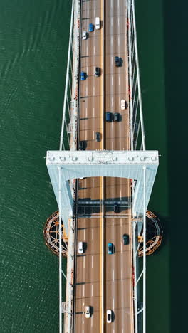 aerial view of a cable-stayed bridge with traffic