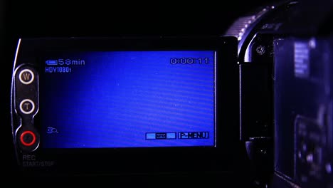 pantalla táctil de la cámara de video en la oscuridad