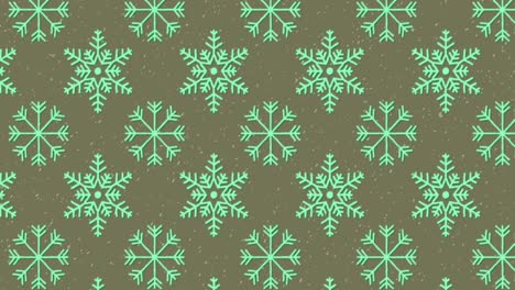 Animation-of-snowflakes-icons-in-seamless-pattern-and-white-particles-against-grey-background