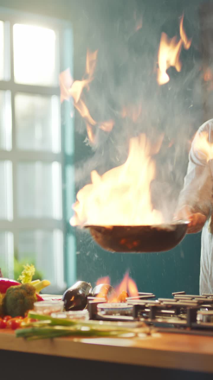 Chef Flambeing Vegetables in a Frying Pan