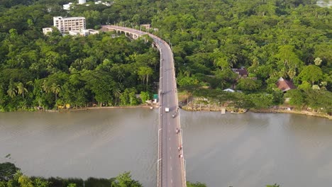 aerial pedestal view revealing the long gabkhan bridge as traffic flows