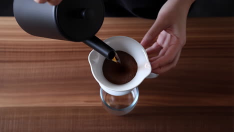 pouring coffee into a filter